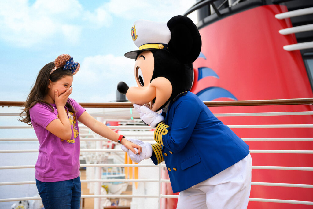 Mickey Mouse meeting a guest onboard the Disney Cruise Line